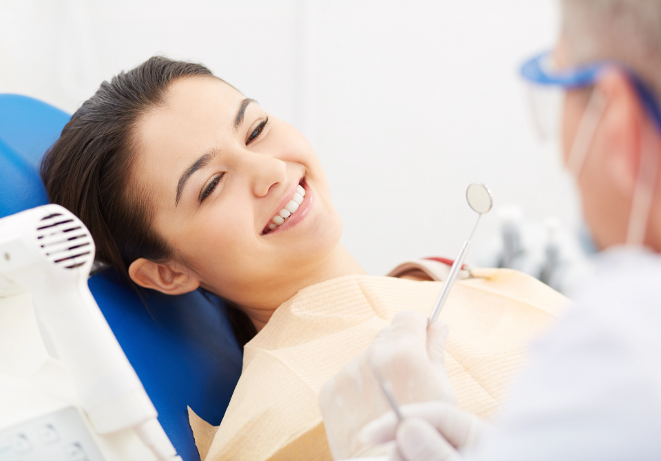 patient smiling at dentist